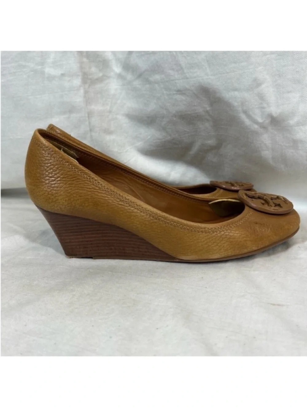 Tory Burch logo round toe brown leather wedge pump